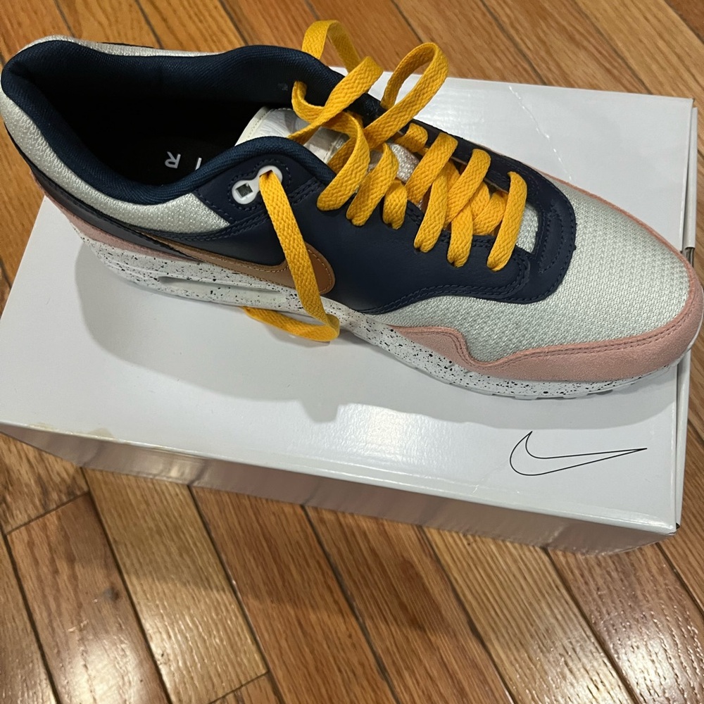 Size 11 women’s Nike custom made designed by young artist Keith Taylor